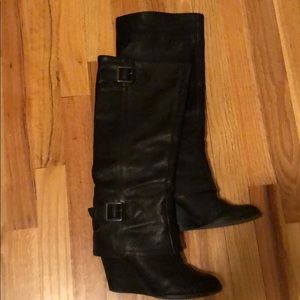 Black leather wedge boots